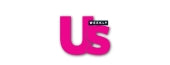 A close-up of the letters 'Us' in bright pink, with a small white square containing the word 'WIZARD' above the 's'.